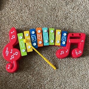 Red Plastic Xylophone with one stick